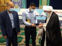 هدیه رهبر معظم انقلاب به ورزشکار بوشهری اهدا شد